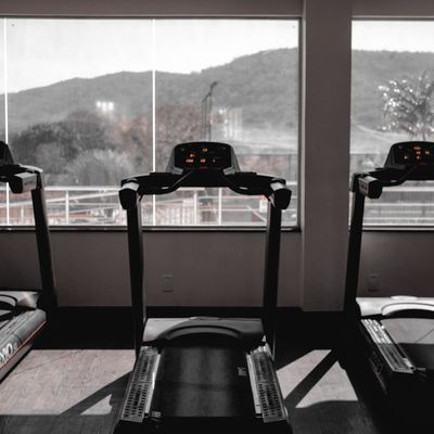 An empty, well-lit workout space with minimal equipment.
